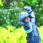 A junior golfer follows his tee shot during the Junior Golf Foundation US Kids tournament at Karen Club at the weekend. PD/ EDWIN OTIENO