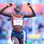 Mary Moraa celebrates after winning the women's 800m Commonwealth Games title. PHOTO/Kelly Ayodi